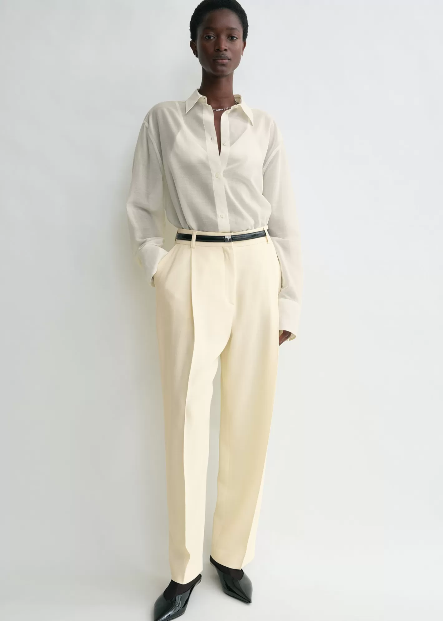 Trousers & Shorts>TOTEME Pleated straight trousers butter