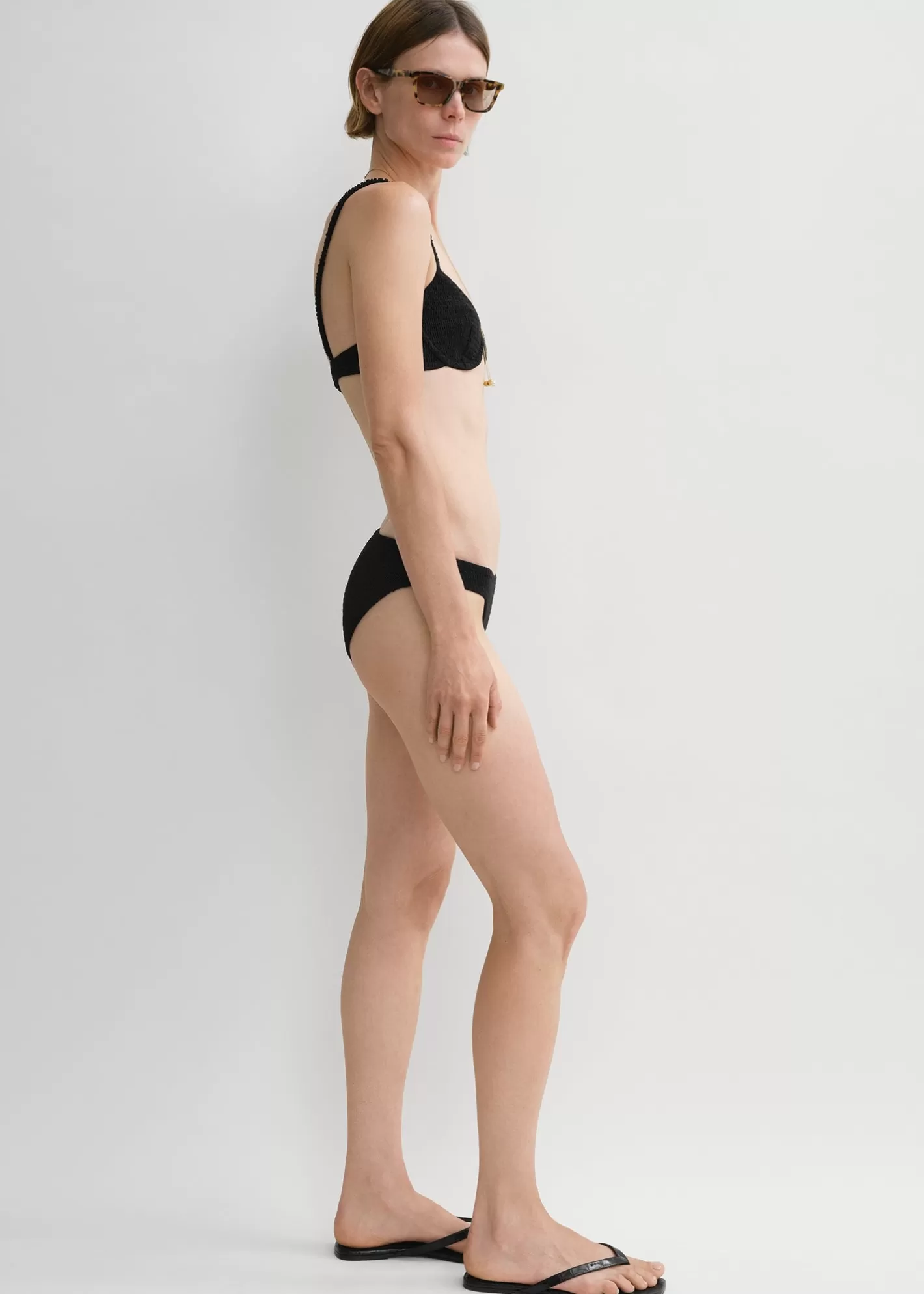 Swim>TOTEME Smocked mid-rise bikini bottoms Black